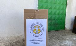 Bozkır'da üniversite öğrencileri ramazan kolisi dağıttı