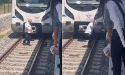 Marmaray'da yavru kediyi fark eden makinist treni durdurdu, yolcular alkışa tuttu