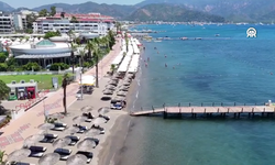Muğla sahillerinde yaz yoğunluğu: Tatilciler plajlara akın etti